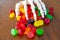 Skeleton hand offering bowl of Candy during halloween