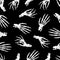 Skeleton hand seamless pattern on black background. halloween bones pattern background.