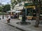 Sketch artist in front of Shakespeare and Company, Paris; cafe diners in background