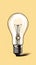 Sketch light bulb. Incandescent lamp or incandescent light globe on yellow background. No people.