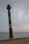 Skew lighthouse in the Baltic Sea. Stormy night on the beach. Harilaid, Saaremaa, Estonia, Europe.