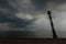 Skew lighthouse in the Baltic Sea. Stormy night on the beach. Kiipsaar, Harilaid, Saaremaa, Estonia, Europe.