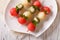 Skewers with watermelon, kiwi and melon closeup. horizontal top