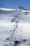 Ski chair lift with skiers. Ski resort in Sierra Nevada