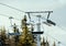 Ski chair lifts on a cable way at a large ski resort in winter