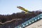 Ski jumping at the 2014 Winter Olympics was held at RusSki Gorki Jumping Center. Nordic skier flies from ski jump in air at World