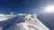 A Ski lift ascending a mountain in the Alps,