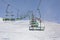 Ski lift in falling snow