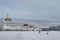 Ski lift and skiers on the ski slope in popular winter resort Kotelnica Bialczanska