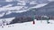 Ski lift, skiers and snowboarders, resort in Carpatian mountains, time lapse