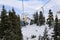 Ski Lift snowy mountain winter forest with chair lift At The Ski Resort in winter.