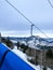 Ski Lift snowy mountain winter forest with chair lift At The Ski Resort in winter. Snowy weather Ski holidays Winter