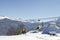 Ski lift sunny day and blue sky background Caucasus mountains ski resort Rosa Khutor Russia