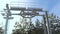Ski lift on winter resort for transportation skiers and snowboarder on snow slope close up. Ski elevator on ropeway on
