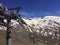 Ski lifts for skiers on the slopes and tops of a mountain, machinery with towers, gears, wheels and cables to take skiers to the