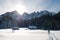 Ski mountaineer reaches alpine hut.