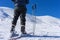 Ski poles near a skier on the mountain Falakro, in Greece.