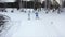 Ski race on track in winter. Footage. Top view of competing professional skiers in colorful costumes riding on track