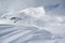 Ski resort landscape, waves of fresh snow and slopes tracks