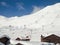 Ski resort of Tignes in winter, ski lifts and village of Tignes le lac