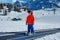 Ski school child wear mask and helmet stand on moving walkway