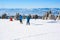 Ski slope, people skiing, mountains view