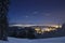 Ski slope in Poiana Brasov winter resort, Romania. Dark scenery. Night long exposure