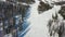 Ski slope. Skiers and snowboarders roll down the track. Aerial photography of a skier descending a wide ski slope