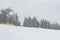 Ski slope at Slotwiny Arena ski station at snowstorm