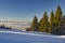 Ski slope of Velka Raca - Oscadnica ski resort and overview to the west