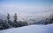 Ski slope and winter mountains panorama