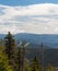 Ski slopes on Cervenohorsks edlo with Praded, Petrovy kameny and Vysoka hole hill on the background in Jeseniky mountains in Czech