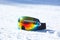 Ski and snowboard mask in snow