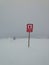 Ski station, piste closed, Are, Sweden. Stop sign in snow, bad weather