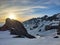 ski tour at sunrise, Ski mountaineering ski touring on a mountain peak in the swiss alps. Clariden. Glarus uri. Winter