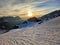 ski tour at sunrise, Ski mountaineering ski touring on a mountain peak in the swiss alps. Clariden. Glarus uri. Winter