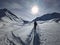 Ski tourers make a lonely track through the deep snow in the mountains above Davos. Ski mountaineering in the Swiss Alps