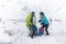 Ski touring couple having break, drinking tea from thermos during hiking up a mountain in the Low Tatras in Slovakia.