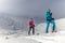 Ski touring couple hiking up a mountain in the Low Tatras in Slovakia.