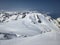 Ski touring group on the ascent to the summit on skis. On the glacier with a view of the Sustenhorn in the Bern Oberland