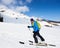 Ski touring man ascending during ski touring in the spectacularly white mountains