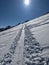 ski touring track in a grandiose winter landscape with high mountains. Mountaineering in the swiss alps. Gemsfairenstock
