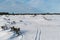 Ski tracks in a great plain landscape with junipers