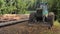 A skidder during wood harvesting