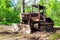 Skidding tractor for timber industry at the forest