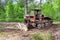 Skidding tractor for timber industry at the forest
