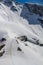 Skier climbing a snowy mountain