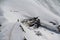 Skier climbing a snowy mountain