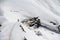 Skier climbing a snowy mountain