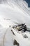 Skier climbing a snowy mountain